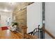 Bright entryway with wood floors and barn door at 24488 E Brandt Ave, Aurora, CO 80016