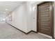 Hallway with door and unit number at 485 Interlocken Blvd # 202, Broomfield, CO 80021