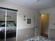 This bedroom features a double door mirrored closet with decor throughout at 12931 W Florida Dr, Lakewood, CO 80228