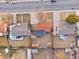 Aerial view showcasing a neighborhood, with the home featuring a fenced backyard at 5116 Jellison St, Arvada, CO 80002