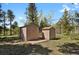 Two storage sheds on a property, providing practical and accessible storage solutions at 9359 Barnes Ave, Conifer, CO 80433