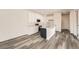 Modern kitchen featuring white cabinets, stainless steel appliances, and a large island at 1296 S Algonquian, Aurora, CO 80018