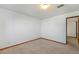 Neutral bedroom with carpet flooring and ample natural light at 1539 S Quail St, Denver, CO 80232