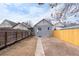 Backyard with gravel pathway and wooden fence at 4442 Josephine St, Denver, CO 80216