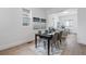 Elegant dining area adjacent to living room, perfect for entertaining at 4442 Josephine St, Denver, CO 80216