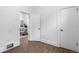 Bright hallway with doors to other rooms and wood floors at 4442 Josephine St, Denver, CO 80216