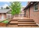 Spacious deck with stairs leading down to the backyard at 730 Cook St, Denver, CO 80206