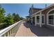 Expansive deck with outdoor furniture, perfect for entertaining and enjoying views of the lush backyard at 1881 Alma Ln, Superior, CO 80027