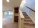 Basement featuring stairs with built-in wine rack and carpet at 1881 Alma Ln, Superior, CO 80027