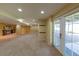 Open-concept finished basement with stylish features, perfect for a home theater or recreational area at 1881 Alma Ln, Superior, CO 80027