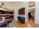 Bright entryway featuring hardwood floors, a built-in desk, and an open view into the kitchen and second floor at 1881 Alma Ln, Superior, CO 80027