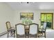 Dining room with views to the exterior at 11333 Conifer Mountain Rd, Conifer, CO 80433