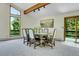 Dining room with natural lighting and a walkout balcony at 11333 Conifer Mountain Rd, Conifer, CO 80433