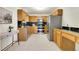Well-lit kitchen with stainless steel appliances and ample storage at 11333 Conifer Mountain Rd, Conifer, CO 80433