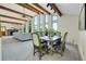 Open-concept kitchen, dining room, and living room features an expansive view at 11333 Conifer Mountain Rd, Conifer, CO 80433