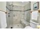 Shower features a glass door, two shower heads, and bench seating at 11333 Conifer Mountain Rd, Conifer, CO 80433