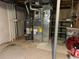 The basement features the home's mechanical systems, plus storage shelves at 18336 E Amherst Dr, Aurora, CO 80013
