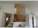 Bright and airy interior featuring open living space and staircase at 18336 E Amherst Dr, Aurora, CO 80013