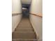 Staircase leading to the basement, showcasing a practical and functional aspect of the home at 18336 E Amherst Dr, Aurora, CO 80013