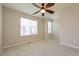Spacious bedroom featuring neutral walls, carpet floors, and bright windows for ample natural light at 9300 E Florida Ave # 1506, Denver, CO 80247