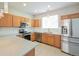 Gourmet kitchen featuring stainless steel appliances, granite countertops, and ample cabinet space at 9300 E Florida Ave # 1506, Denver, CO 80247