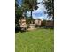 Fenced backyard with garden shed on a sunny day at 5201 E 127Th Dr, Thornton, CO 80241
