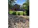 View of the landscaped backyard featuring a patio with pergola and healthy grass at 5201 E 127Th Dr, Thornton, CO 80241