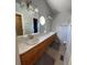 Bathroom features double sinks with lots of counter space, large mirrors, vanity lighting, and lots of storage at 5201 E 127Th Dr, Thornton, CO 80241