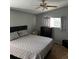 Comfortable bedroom with natural light, fan, and neutral decor at 5201 E 127Th Dr, Thornton, CO 80241