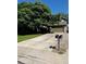 Well-kept lawn and a spacious driveway to a two-car garage at 5201 E 127Th Dr, Thornton, CO 80241