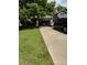 Cozy single-Gathering home with mature trees, a well-manicured lawn, and driveway at 5201 E 127Th Dr, Thornton, CO 80241