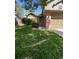 Charming home featuring a well-manicured lawn and an inviting entryway at 5201 E 127Th Dr, Thornton, CO 80241