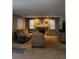 Living room features comfortable furniture, fireplace, and neutral walls at 5201 E 127Th Dr, Thornton, CO 80241