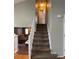 Carpeted staircase leading to the upper level of the home at 5201 E 127Th Dr, Thornton, CO 80241