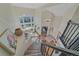 Grand entryway with soaring ceilings, large windows, and staircase at 10127 W 100Th Ct, Westminster, CO 80021