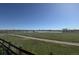 Scenic community view of a walking path along the water at 10127 W 100Th Ct, Westminster, CO 80021