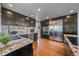 Spacious kitchen featuring stainless steel appliances, granite countertops, and custom cabinetry at 10127 W 100Th Ct, Westminster, CO 80021