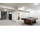 Finished basement with pool table and gray carpet offers entertainment possibilities at 9388 E 59Th Pl, Denver, CO 80238