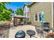 Outdoor patio featuring a gazebo, BBQ grill, and comfortable seating, perfect for outdoor dining and entertaining at 1588 W 111Th Ave, Northglenn, CO 80234