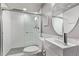 Modern bathroom with a glass-enclosed shower, white subway tile, and a sleek sink, offering a clean design at 1588 W 111Th Ave, Northglenn, CO 80234