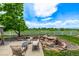 Outdoor patio with stylish seating, a stone water feature, and expansive views of the greenbelt at 1588 W 111Th Ave, Northglenn, CO 80234