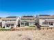 Eye-level exterior shot of neighboring houses with solar panels with a fenced-in backyard at 2541 Leafdale Cir, Castle Rock, CO 80109