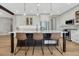 Bright kitchen with a large island, stainless steel appliances, and stylish pendant lighting at 2541 Leafdale Cir, Castle Rock, CO 80109
