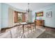 Bright dining room with bay window and wood-trimmed walls at 1149 Steele St, Denver, CO 80206