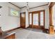 Entryway with stained-glass window and hardwood floors at 1149 Steele St, Denver, CO 80206