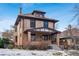 Two-story brick home with classic architectural details at 1149 Steele St, Denver, CO 80206