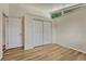 Bedroom with new flooring and closet at 5380 S Prescott St, Littleton, CO 80120