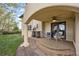 Charming backyard patio with sitting area and garden access at 1069 Crestmoor Dr, Boulder, CO 80303