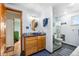 Modern bathroom with a glass shower, custom vanity, and stylish accents at 1069 Crestmoor Dr, Boulder, CO 80303