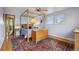 Inviting bedroom with a four poster bed, hardwood floors, and ample natural light at 1069 Crestmoor Dr, Boulder, CO 80303